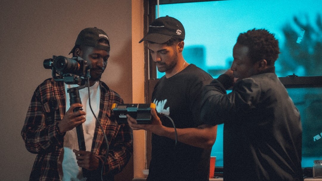 Group of students in a media production workshop with an instructor